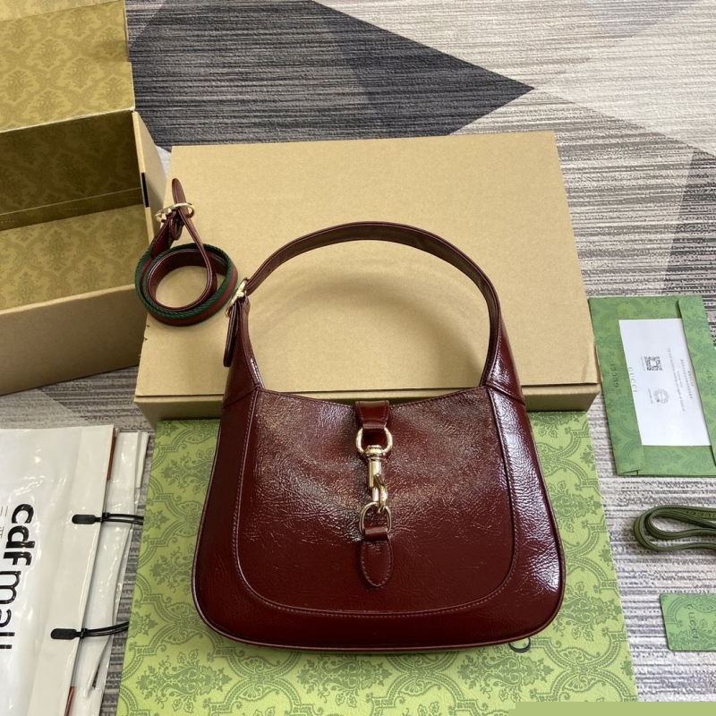 G*u*i top handle bags